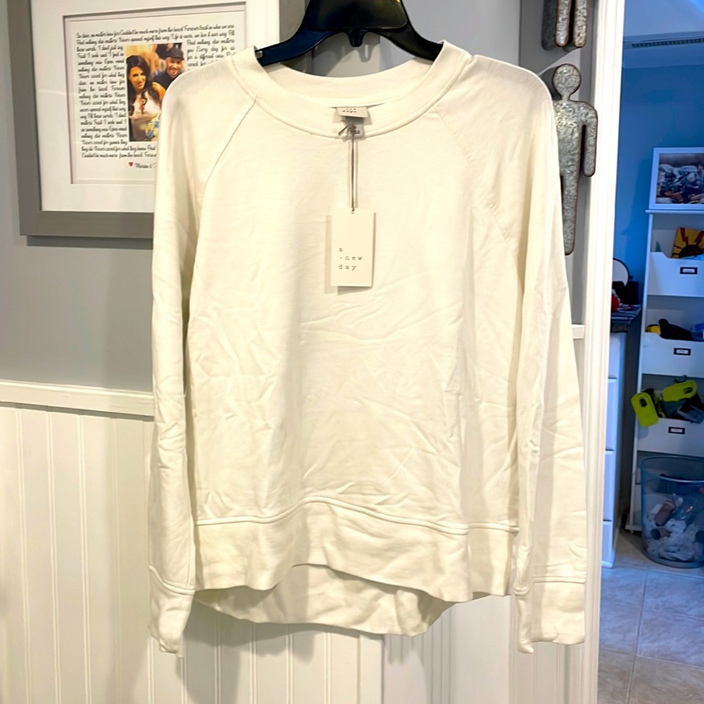 A New Day sweatshirt